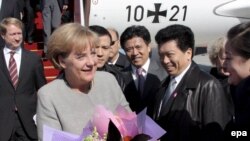 Китай -- Зустріч канцлера Німеччини Анґели Меркель у аеропорту Пекіна, 23 жовтня 2008 р.