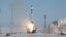 A Russian Soyuz booster rocket, carrying the Progress cargo space craft, blasts off for the International Space Station from the Baikonur cosmodrome in February 2017.