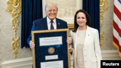 Лідерка венесуельської опозиції Марія Коріна Мачадо (п) і президент США Дональд Трамп, Вашингтон, 15 січня 2026 року