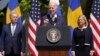 U.S. President Joe Biden (center), accompanied by Swedish Prime Minister Magdalena Andersson (right) and Finnish President Sauli Niinisto, speaks in the Rose Garden of the White House on May 19.