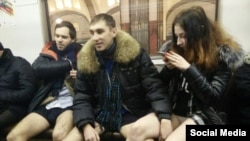 Moscow's police are said to be searching for some young men and women who posted photographs via social networks of themselves in underwear on the subway.