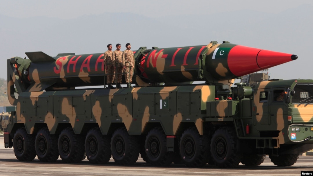 Pakistani military personnel stand beside a Shaheen-III surface-to-surface ballistic missile during a military parade. (file photo)