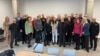 US envoy John Coale with released Belarusian political prisoners at the Belarus-Lithuania border on September 16. 