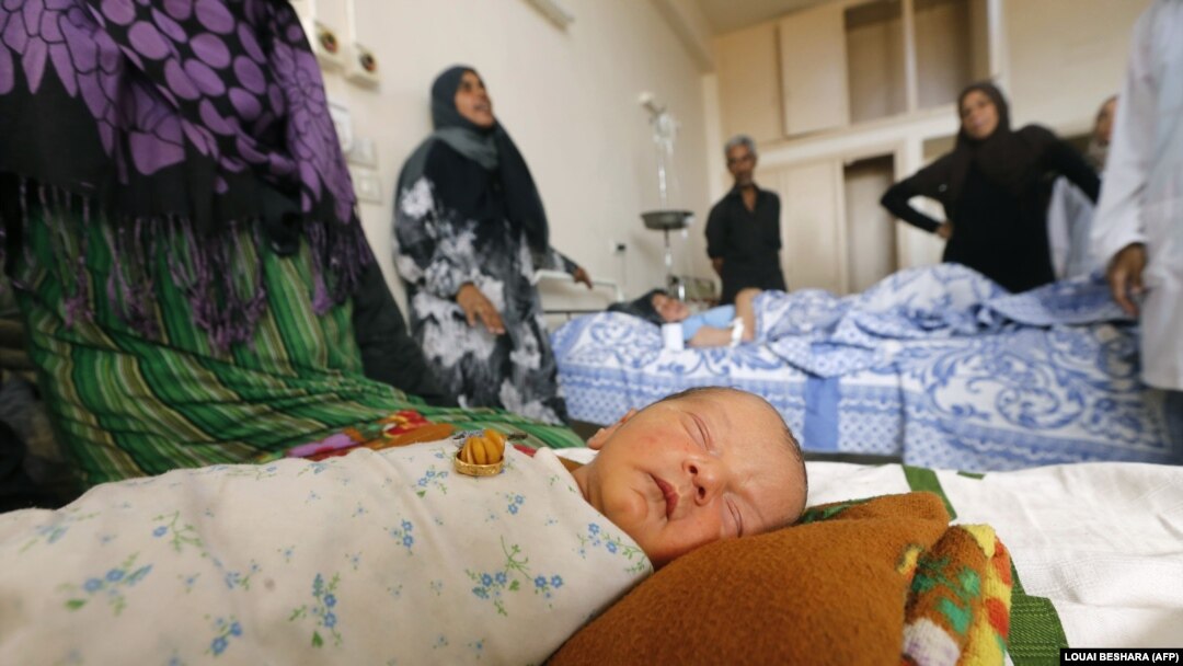 A newborn baby is seen in a hospital in the eastern city of Deir al-Zour on September 20 as Syrian government forces continued to press forward with Russian air cover in an offensive against Islamic State extremists.