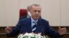 CYPRUS -- Turkey's President Recep Tayyip Erdogan addresses the Turkish Cypriot Parliament, in Nicosia, July 19, 2021. 