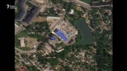 Последствия украинского удара по складу боеприпасов в здании Камаз-Центра в Донецке