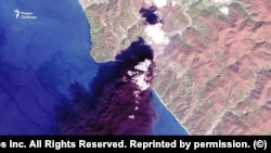 A satellite image of a fire on the premises of an oil depot in Tuapse on the Black Sea after a Ukrainian strike on April 16.