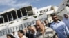 Richard Goldstone (right) walks with Hamas deputy Ahmed Bahr (left) and members of his delegation as they visit the Palestinian parliament building that was destroyed during Israel's December-January offensive in Gaza City.