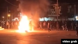 نمایی از اعتراضات در شهر کوار استان فارس در شامگاه پنجشنبه