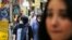 Iran -- Iranians, some wearing protective gear amid the COVID-19 pandemic, shop at the Tajrish Bazaar market in the capital Tehran on July 14, 2020. (Photo by ATTA KENARE / AFP)