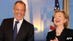 Russian Foreign Minister Sergey Lavrov and U.S. Secretary of State Hillary Clinton both got a good laugh out of the "overload" button that Clinton offered up.