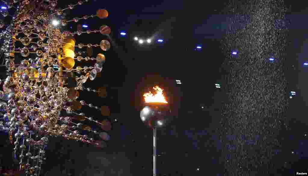 The Olympic flame is pictured before being extinguished during the closing ceremony.