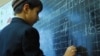 A student does exercises at a Turkmen-Russian bilingual school in Ashgabat.