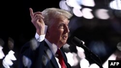 Fostul președinte al SUA și candidatul republican la președinția din 2024, Donald Trump, în timpul ultimei zile a Convenției Naționale Republicane. 18 iulie 2024.