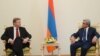 Armenia - President Serzh Sarkisian (R) meets with EU Enlargement Commissioner Stefan Fuele in Yerevan, 10Jul2013.