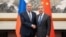 Міністр закордонних справ Росії Сергій Лавров і його китайський колега Ван Ї під час зустрічі в Пекіні 14 квітня