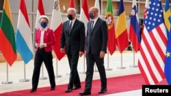 European Commission President Ursula von der Leyen (left to right), U.S. President Joe Biden, and European Council President Charles Michel arrive for the EU-U.S. summit in Brussels on June 15.
