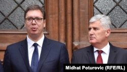 Serbian President Aleksandar Vucic (left) and the chairman of Bosnia's three-man presidency, Dragan Covic, in Sarajevo on September 7.