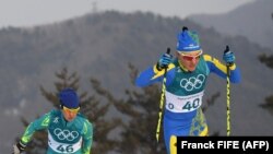 Казахстанка Елена Коломина (под номером 46) на состязаниях по скиатлону в Пхенчхане. 10 февраля 2018 года.