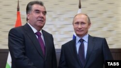 Tajik President Emomali Rahmon (left) made his remarks during a meeting with Russian President Vladimir Putin in Sochi on October 6. 