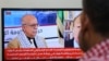 На снимката от 30 август се вижда как кадри с убития премиер на хутите Ахмед Галеб Насер ал-Рахави се показват по телевизията в Йемен. 
