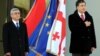 Georgia -- President Mikheil Saakashvili (R) and his visiting Armenian counterpart Serzh Sarkisian attend an official welcome ceremony in Tbilisi, 29Nov2011