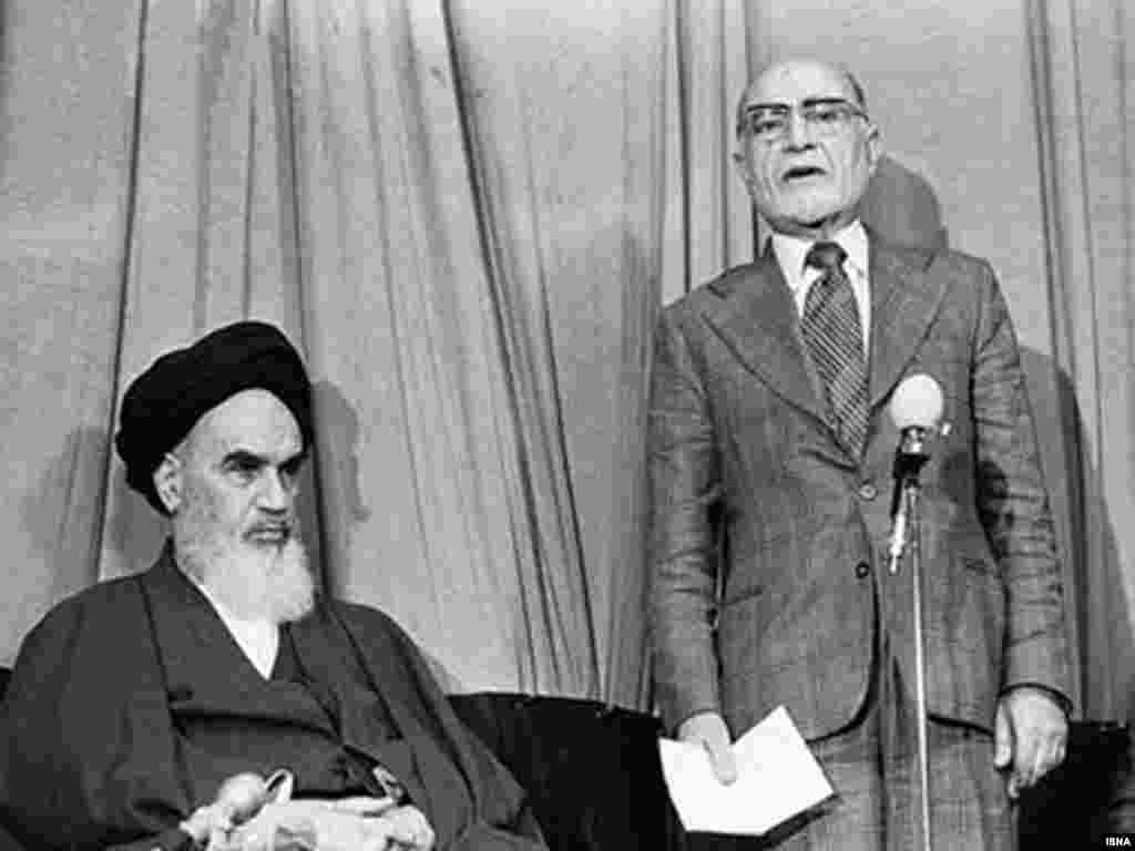 Khomeini introduces Mehdi Bazargan as interim prime minister during the Islamic revolution in February 1979.