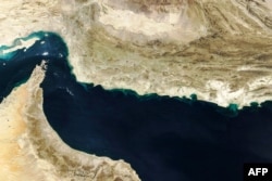 A satellite image showing the Strait of Hormuz (top left) and Gulf of Oman.