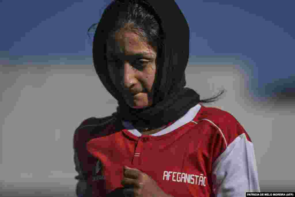 A player of Afghanistan national women football team arrives for a training session at Odivelas, outskirts of Lisbon on September 30, 2021.