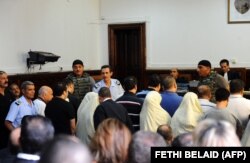 یکی از دادگاه‌های بستگان بن‌علی از جمله شماری از اعضای خانواده طرابلسی در اوت ۲۰۱۱