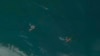 A satellite image from Planet Labs PBC shows the detained oil tankers the Niovi (left) and Advantage Sweet off the coast of Bandar Abbas, Iran, on May 6. 