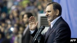 Iranian Vice President Eshaq Jahangiri waives to the crowd as he attends a campaign rally for the presidential election in Tehran on May 13.