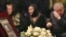 Mourners at Anastasia Baburova's wake in Moscow