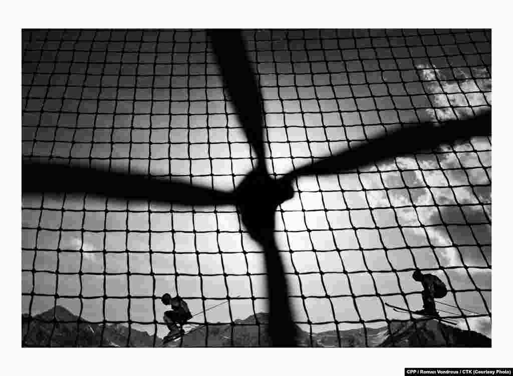 First Prize, Sport:&nbsp;Skiers compete in the Men&#39;s Ski Cross event at the Winter Olympics in Sochi, Russia. (CTK/Roman Vondrous) 