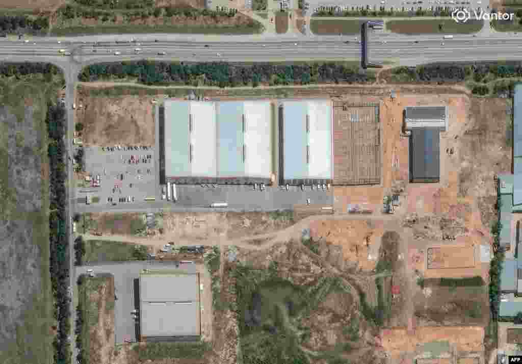 Handout satellite images from Vantor show a Wildberries warehouse in Simferopol, Russia, on July 22 and on August 4.