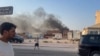 Smoke billows after an Israeli air strike in the Qatari capital, Doha, on September 9.