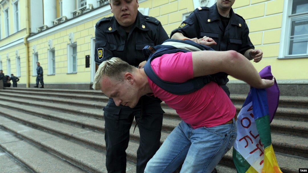 A gay activist is detained by police during a gay-pride parade in St. Petersburg in June 2011. Gavrikov says the law "gives a signal to people who are eager to express their hate and their aggression."