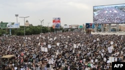 Yemeni supporters of the Iran-backed Houthi movement gather during a rally against what the group says are restrictions imposed by the Saudi-led coalition on Houthi-controlled areas of Yemen, in Sanaa on July 17. 