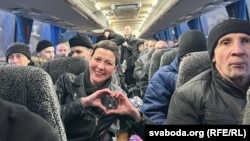 Maryya Kalesnikava, a prominent 2020 protest leader, travels with other political prisoners freed by Belarus on December 12. 