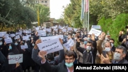 Iranian teachers protest their low incomes in Qom last month. 