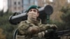 BAKU, AZERBAIJAN - DECEMBER 10, 2020: A Cobra armoured vehicle equipped with a PK machine gun and a Shershen anti-tank guided missile is seen during a military parade marking the end of the Nagorno Karabakh military conflict. 