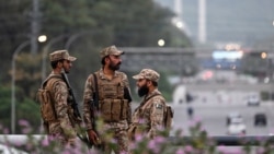 Pakistani soldiers stand guard on a street leading to the Red Zone area after tightened security measures ahead of the expected US–Iran peace talks in Islamabad. President Donald Trump on April 25 called off the planned trip of the lead US negotiators.