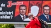 Predizborni plakat vodeće albanske stranke DUI sa fotografijama Zaeva i Mickoskog i slobodnim mestom između, te sloganom "Albanac premijer. Zašto da ne?"