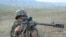 Nagorno-Karabakh -- A Karabakh Armenian soldier practices sniper fire during a military exercise.