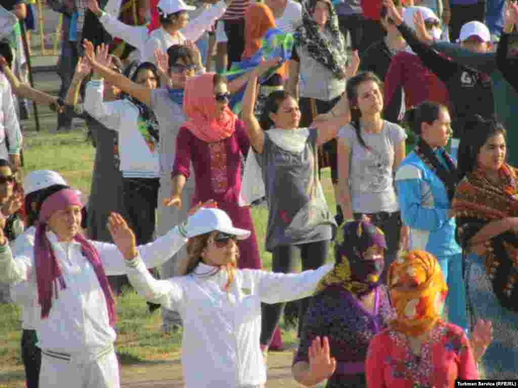 Young women practice some choreographed moves for Turkmenistan's Independence Day celebrations.