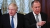 Russian Foreign Minister Sergei Lavrov (right) and British Foreign Secretary Boris Johnson in Moscow on December 22