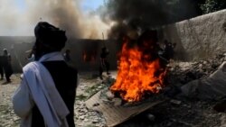 Tribal Vigilantes Burn Homes Of Alleged Killers In Afghanistan