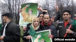 Demonstrators rally in support of Libya's Muammar Qaddafi in Belgrade in March 2011 in an event organized by the Communist Party.