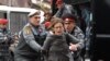 Armenia - Riot police detain a protester in Yerevan, 02Dec2013.