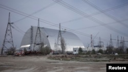 The Chernobyl plant is located north of Kyiv and close to the Belarusian border. Its nuclear reactors are enclosed in a giant steel and concrete sarcophagus and are not operating. (file photo)